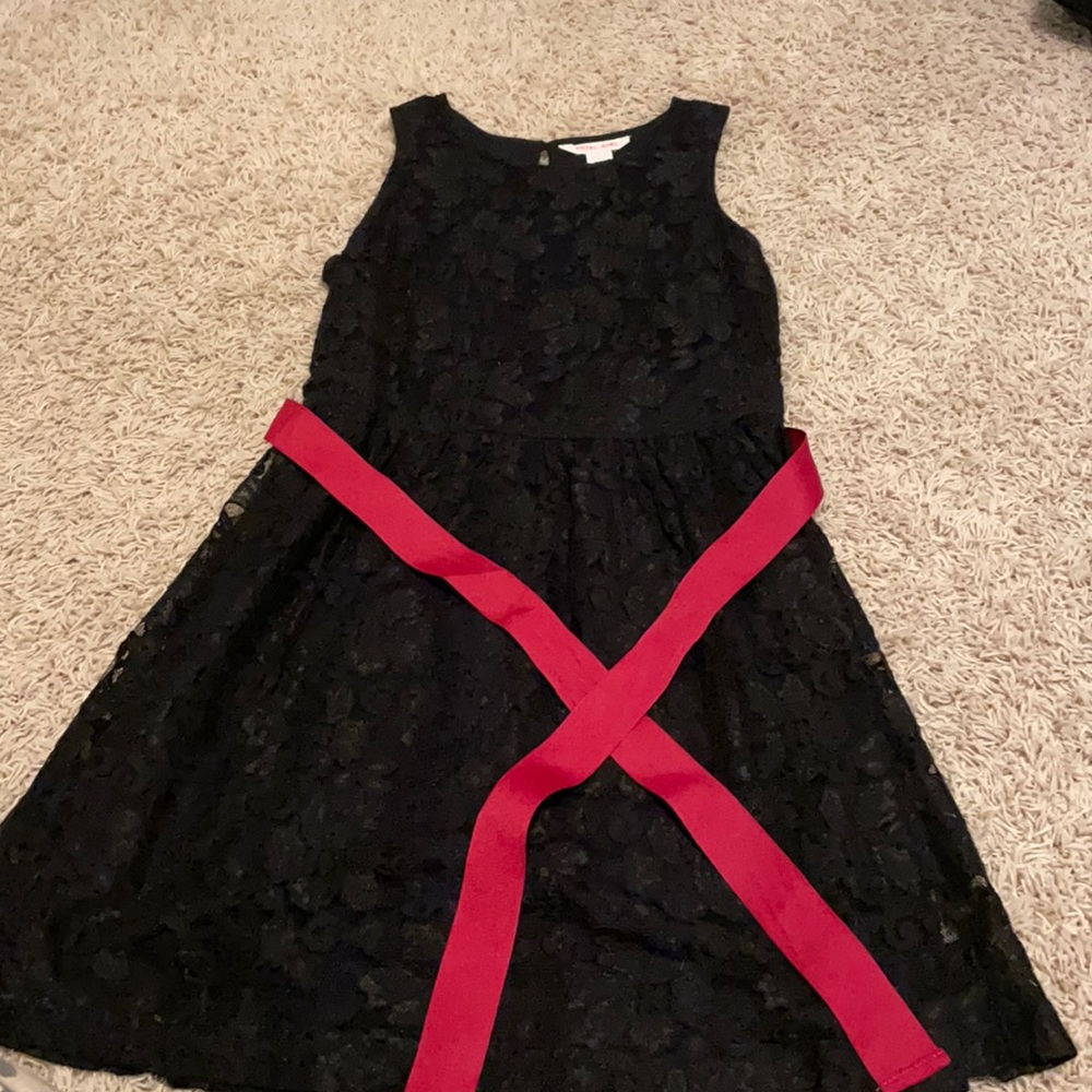 Black lace dress with red ribbon